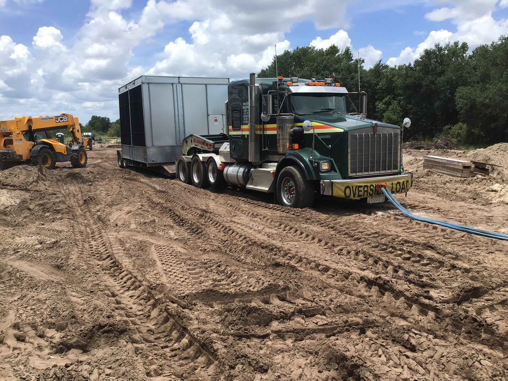 Superior Rigging heavy hauler on a job site