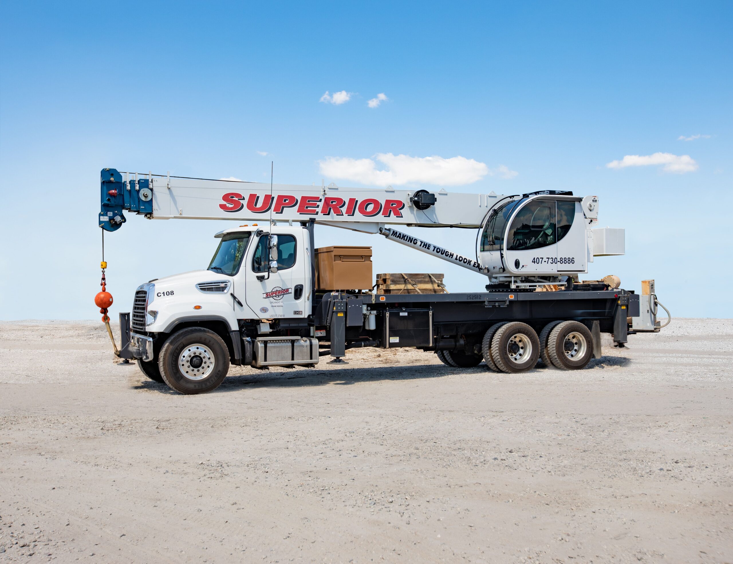 Superior Rigging white truck crane